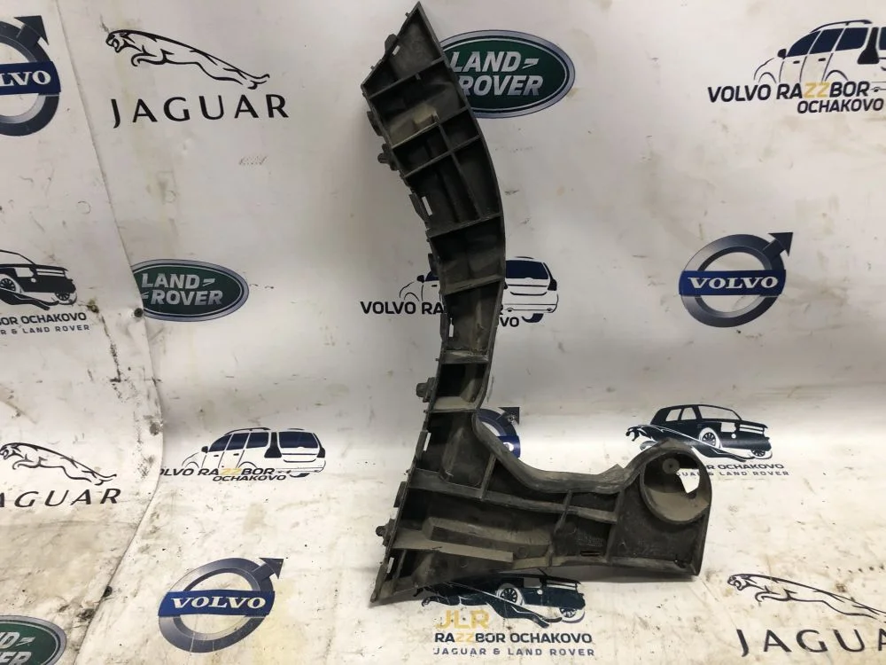 Кронштейн заднего бампера левый Volvo XC60 дорест